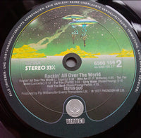 Status Quo : Rockin' All Over The World (LP, Album)
