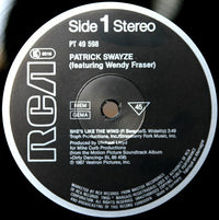 Patrick Swayze Featuring Wendy Fraser / Maurice Williams & The Zodiacs / Merry Clayton : She's Like The Wind (12", Maxi)