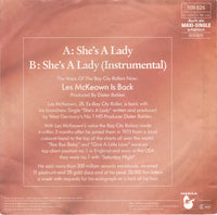 Les McKeown : She's A Lady (7", Single)