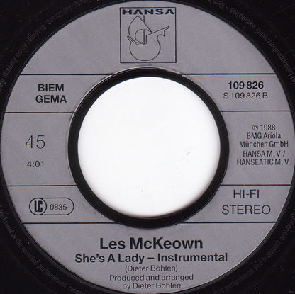 Les McKeown : She's A Lady (7", Single)