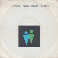 The Twins : The Game Of Chance (7", Single)