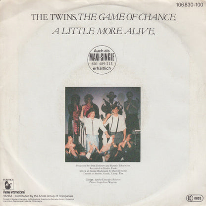 The Twins : The Game Of Chance (7", Single)