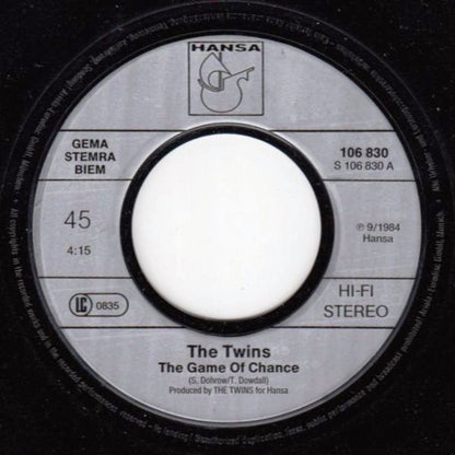 The Twins : The Game Of Chance (7", Single)