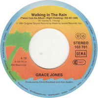 Grace Jones : Walking In The Rain / Pull Up To The Bumper (7", Single)