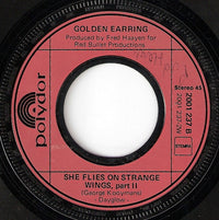 Golden Earring : She Flies On Strange Wings (Part 1 & 2) (7", Single)