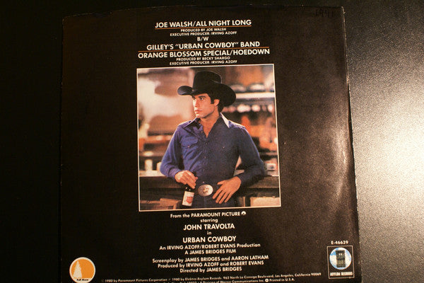 Joe Walsh  /  Gilley's "Urban Cowboy" Band : All Night Long / Orange Blossom Special / Hoedown (7", Single, Styrene, Ter)