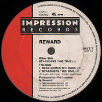Reward (5) : Strangers This Time (12", Single)