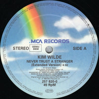 Kim Wilde : Never Trust A Stranger (12", Single)