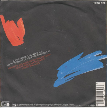 Double : Woman Of The World (7", Single)