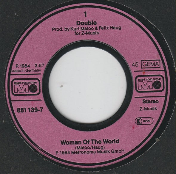 Double : Woman Of The World (7", Single)