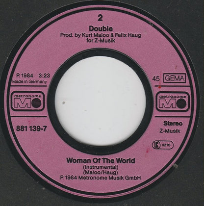 Double : Woman Of The World (7", Single)