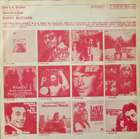 Tucky Buzzard : She's A Striker / Heartbreaker (7", Single)