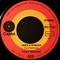 Tucky Buzzard : She's A Striker / Heartbreaker (7", Single)