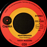 Tucky Buzzard : She's A Striker / Heartbreaker (7", Single)