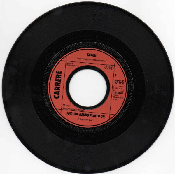Saxon : And The Bands Played On (7", Single)