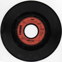 Saxon : And The Bands Played On (7", Single)