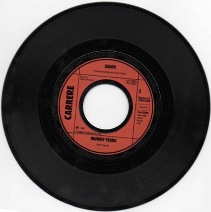 Saxon : And The Bands Played On (7", Single)