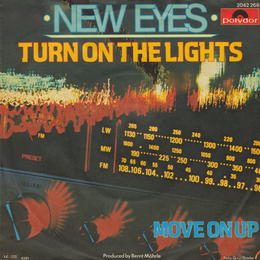 New Eyes* : Turn On The Lights (7", Single)