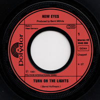 New Eyes* : Turn On The Lights (7", Single)