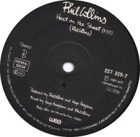 Phil Collins : Another Day In Paradise (7", Single, Sol)