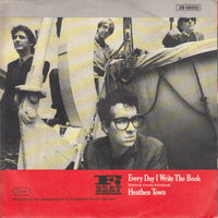 Elvis Costello And The Attractions* : Everyday I Write The Book (7", Single)