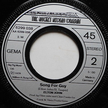 Elton John : Return To Paradise (7", Single)