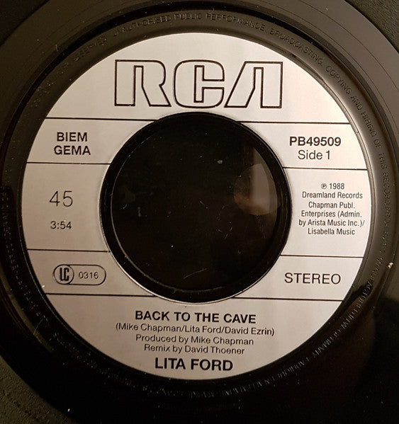 Lita* : Back To The Cave (7", Single)