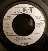 Lita* : Back To The Cave (7", Single)