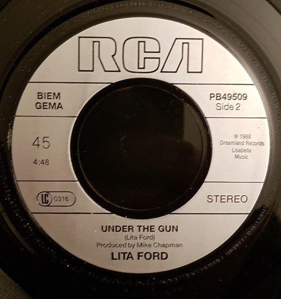 Lita* : Back To The Cave (7", Single)
