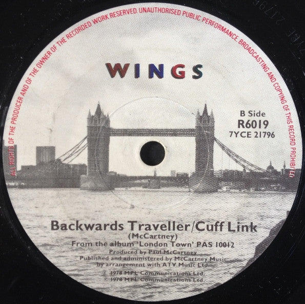 Wings (2) : With A Little Luck (7", Single, Sol)