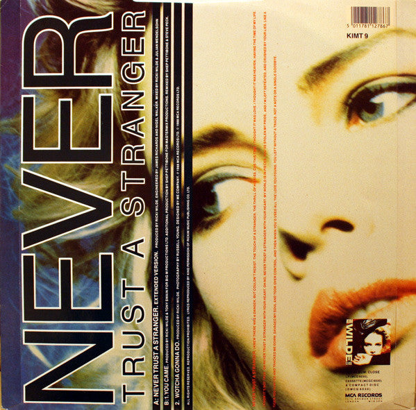 Kim Wilde : Never Trust A Stranger (12", Single)