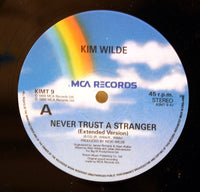 Kim Wilde : Never Trust A Stranger (12", Single)
