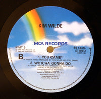 Kim Wilde : Never Trust A Stranger (12", Single)