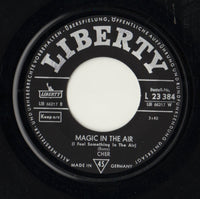 Cher : Behind The Door / Magic In The Air (I Feel Something In The Air) (7", Single)