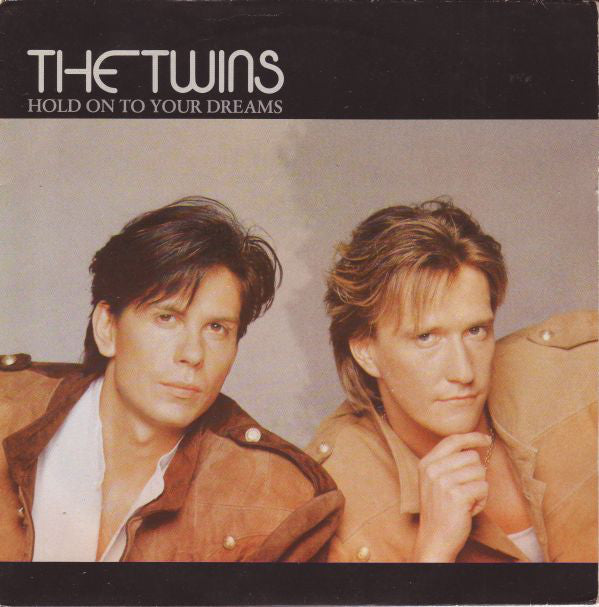 The Twins : Hold On To Your Dreams (7", Single)