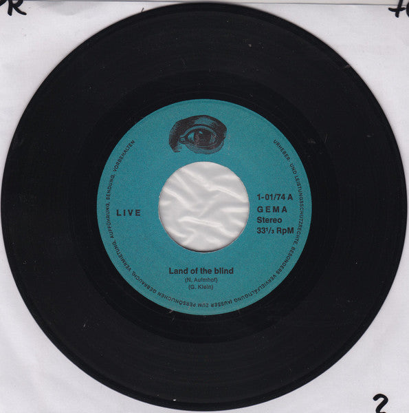 Live (4) : Land Of The Blind  (7", Single)