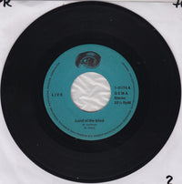 Live (4) : Land Of The Blind  (7", Single)