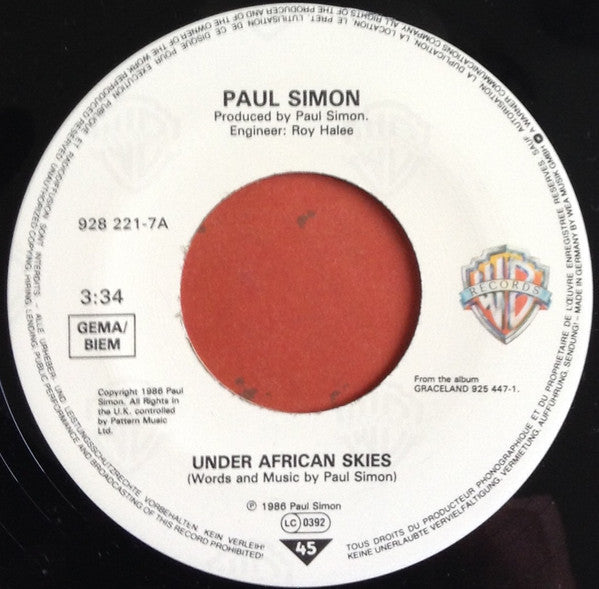 Paul Simon : Under African Skies (7", Single)