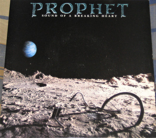 Prophet (13) : Sound Of A Breaking Heart (7", Single)