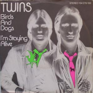 Twins* : Birds And Dogs / I'm Staying Alive (7", Single)