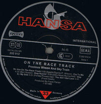 Precious Wilson And Sky Train (2) : On The Race Track (LP, Album)