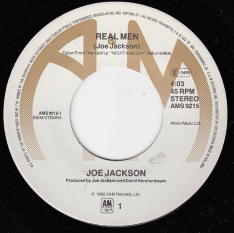 Joe Jackson : Real Men B/W Chinatown (7", Single)