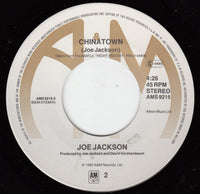 Joe Jackson : Real Men (7", Single)