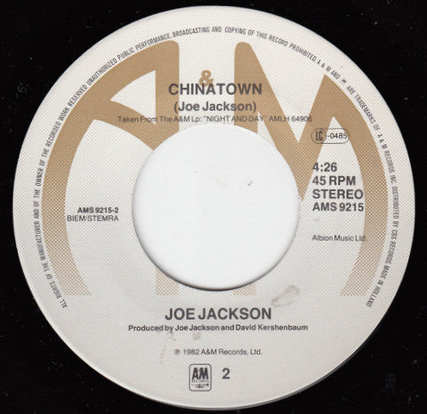 Joe Jackson : Real Men B/W Chinatown (7", Single)