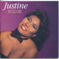 Justine Pelmelay : Hold Me (7", Single)