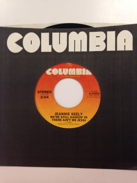 Jeannie Seely : We're still hangin' In There Ain't We Jessi/I Don't Need Love Anymore  (7", Single)