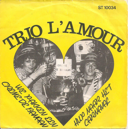 Trio L'Amour : We Pakken Een Creme De Banaan / Hup Naar Het Carnaval (7", Single)
