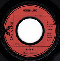 Wonderland (8) : Moscow / Poochy (7", Single, RE)