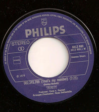Trinity (14) : 002.345.709 (That's My Number) (7", Single)