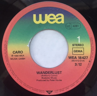 Caro (7) : Wanderlust / Far From Home (7", Single)